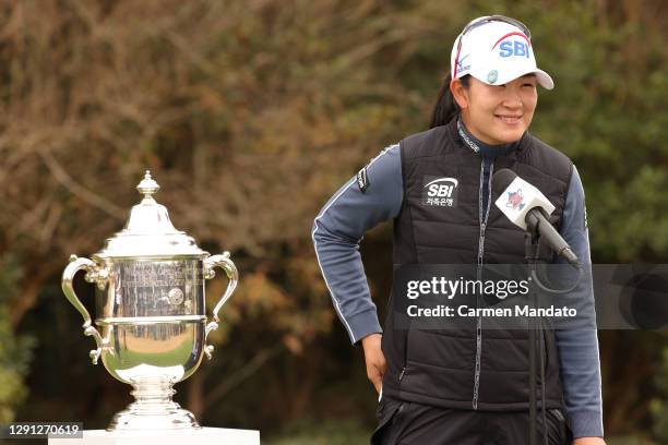 Lim Kim of Korea looks on with the trophy after winning the 75th U.S. Women's Open Championship at Champions Golf Club Cypress Creek Course on...