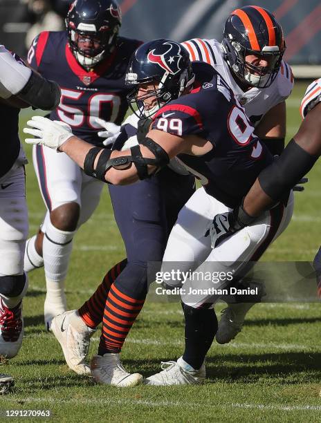 Watt of the Houston Texans rushes against Germain Ifedi of the Chicago Bears at Soldier Field on December 13, 2020 in Chicago, Illinois. The Bears...