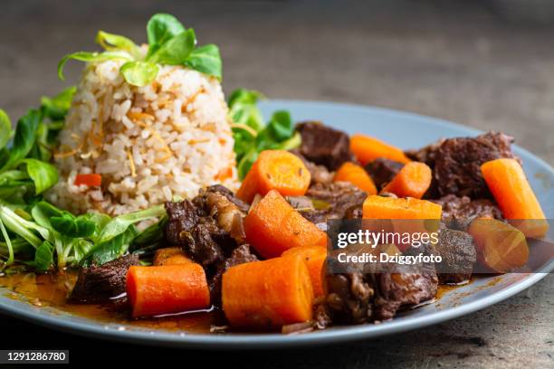 beef stew served with rice - beef bourguignon stock pictures, royalty-free photos & images