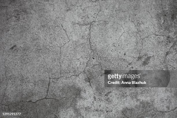 textured aged gray concrete grunge background. abstract cement stone wall backdrop. - roccia foto e immagini stock
