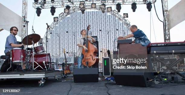 Percussionist Billy Martin, bassist Chris Wood and keyboardist John Medeski of Medeski Martin & Wood performs during the 2011 Hangout Music Festival...