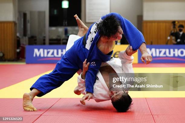Hifumi Abe throws Joshiro Maruyama to win the Judo Men's -66kg Tokyo Olympic playoff at Kodokan on December 13, 2020 in Tokyo, Japan.