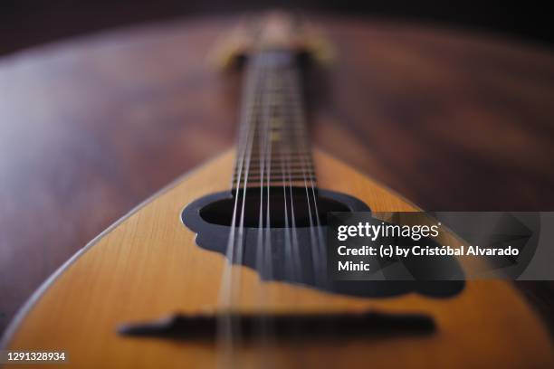 mandolin on a table - mandolin stock pictures, royalty-free photos & images