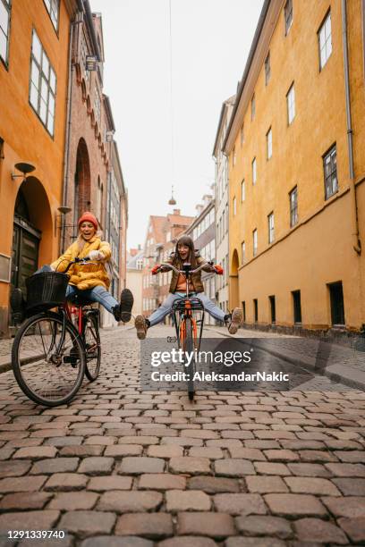 bike ride in our city - copenhagen cycling stock pictures, royalty-free photos & images