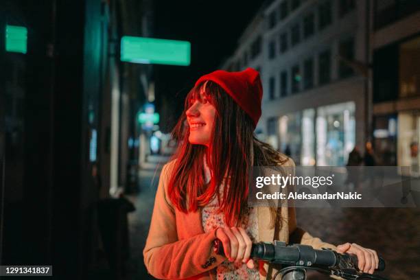 late night ride - red hat stock pictures, royalty-free photos & images