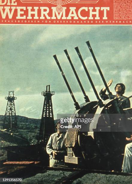 Canons antiaériens de la défense allemande protégeant des puits de pétrole en Roumanie lors de la Seconde Guerre Mondiale, en couverture du magazine...