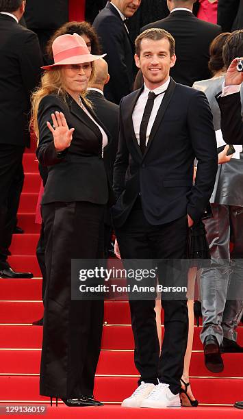 Faye Dunaway and Liam O'Neill attend "The Beaver" Premiere during the 64th Cannes Film Festival at the Palais des Festivals on May 17, 2011 in...