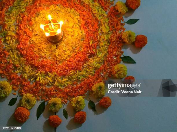 onam pookalam/floral carpet/rangoli-kerala/onam festival - pookalam stock pictures, royalty-free photos & images