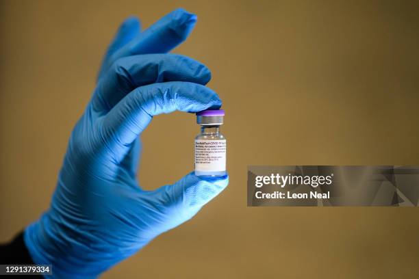 Vial of the Pfizer/BioNTech Covid-19 vaccine is seen during a vaccination clinic at the Sir Ludwig Guttmann Health and Wellbeing Centre on December...