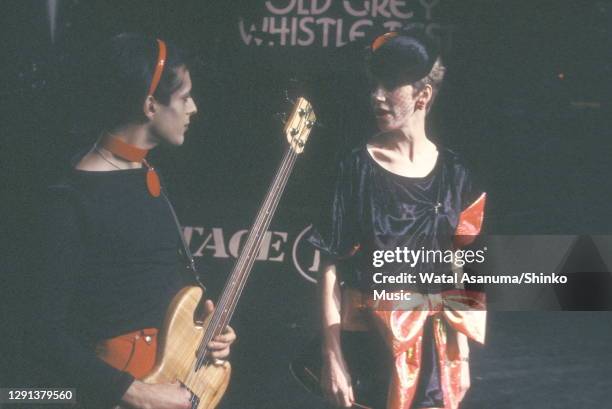 Angie Bowie performs on the BBC TV show 'The Old Grey Whistle Test' with Mick Karn, bass player from the band Japan, London, 8th December 1982.