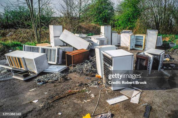abandoned refigerators and freezers awaiting disposal or recycling. - electrical equipment stock pictures, royalty-free photos & images