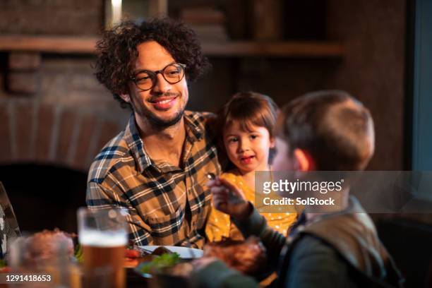 me and my children out for sunday lunch - parent and child meal stock pictures, royalty-free photos & images