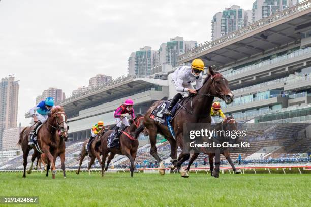 Jockey Vincent Ho Chak-yiu riding Golden Sixty wins the Race 7 Longines Hong Kong Mile at Sha Tin Racecourse on December 13, 2020 in Hong Kong.