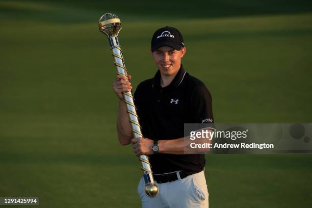 Matthew Fitzpatrick of England poses with the trophy after winning the DP World Tour Championship at Jumeirah Golf Estates on December 13, 2020 in...