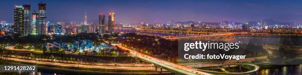 highrise highways futuristic skyscrapers glittering cityscape aerial panorama seoul korea - han river stock pictures, royalty-free photos & images