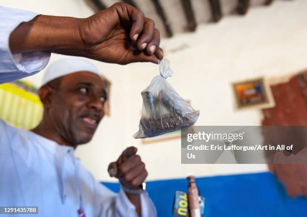 Kenyan witch doctor practicing black magic in his house, Lamu County, Lamu, Kenya on March 5, 2011 in Lamu, Kenya.