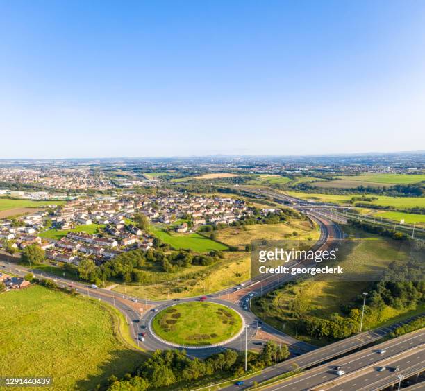 housing estate and transport links from above - glasgow uk stock pictures, royalty-free photos & images
