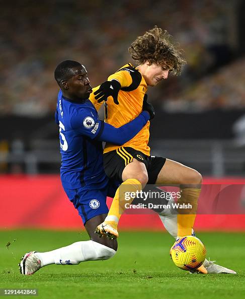 Wolves Silva Fabio Silva of Wolves is challenged by Kurt Zouma of Chelsea during ...