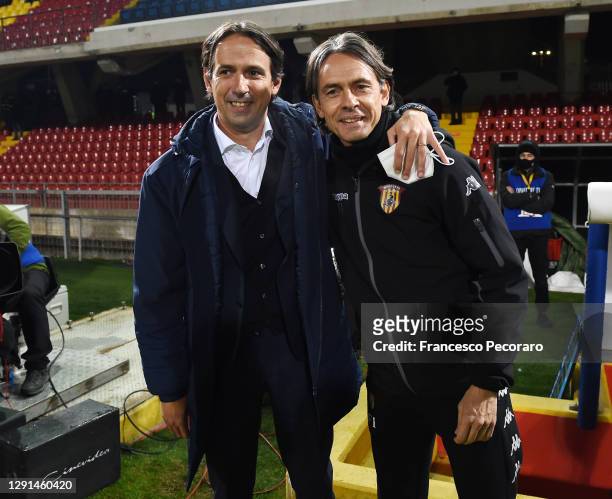 Simone Inzaghi, SS Lazio coach, greets his brother Filippo Inzaghi, the Benevento Calcio coach before the Serie A match between Benevento Calcio and...