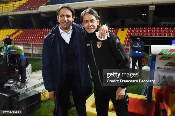 Simone Inzaghi, SS Lazio coach, greets his brother Filippo Inzaghi, the Benevento Calcio coach before the Serie A match between Benevento Calcio and...