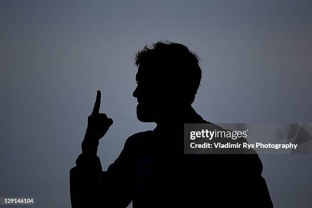 Sebastian Vettel of Germany and Red Bull Racing celebrates after winning the pole position during the qualifying for the Formula One Grand Prix of...