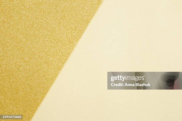 shiny glowing golden background. festive abstract golden background for holidays, new year, christmas. - new year gifts imagens e fotografias de stock