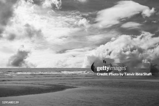 fishing boat sailing out to sea - chittagong bildbanksfoton och bilder