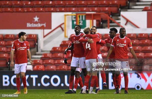 Lewis Grabban of Nottingham Forest celebrates with teammates after scoring their team's second goal during the Sky Bet Championship match between...