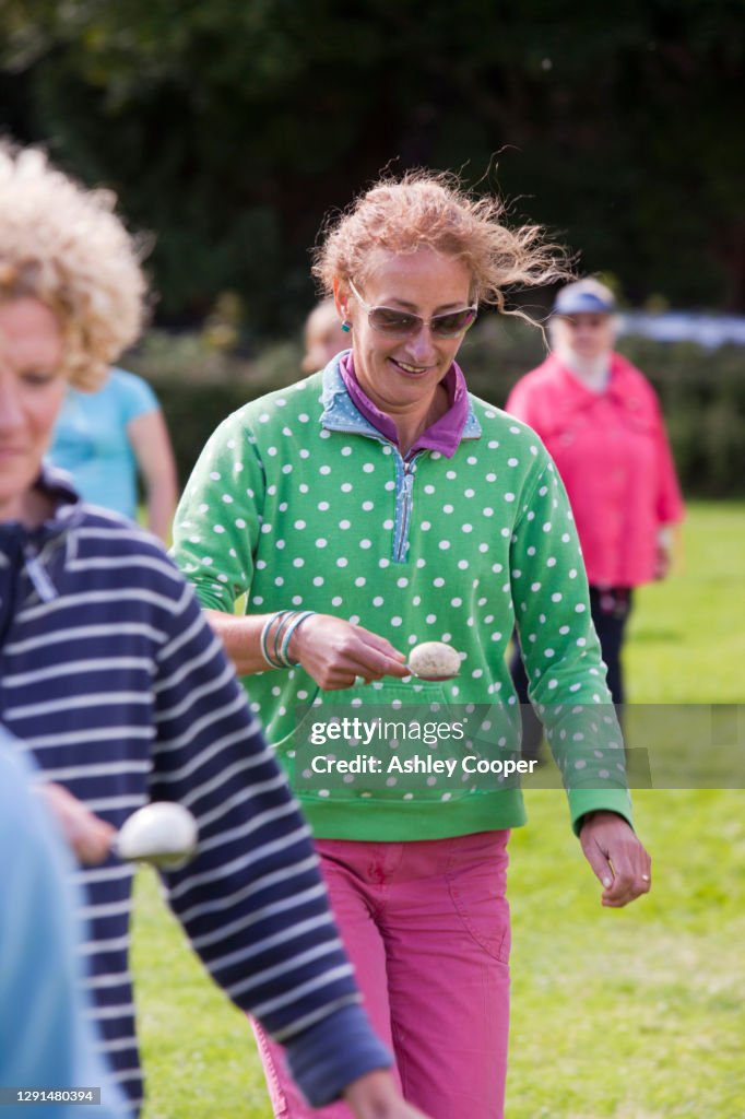 The womens egg and spoon race at the Rusland Vale Horticultural society annual show. The Rusland show is a very traditional Lakeland family show in Rusland, South Cumbria, UK.