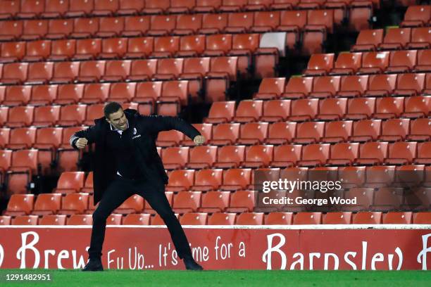 Valerien Ismael, head coach of Barnsley celebrates after their sides second goal scored by Victor Adeboyejo of Barnsley during the Sky Bet...