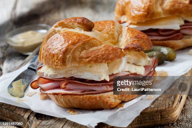 ham and brie croissant sandwiches with dijon mustard - baked brie stock pictures, royalty-free photos & images