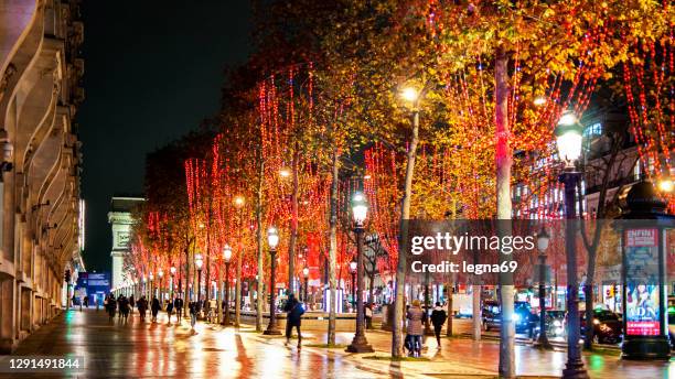 the champs elysées avenue, at christmas approaches. - paris nice stock pictures, royalty-free photos & images