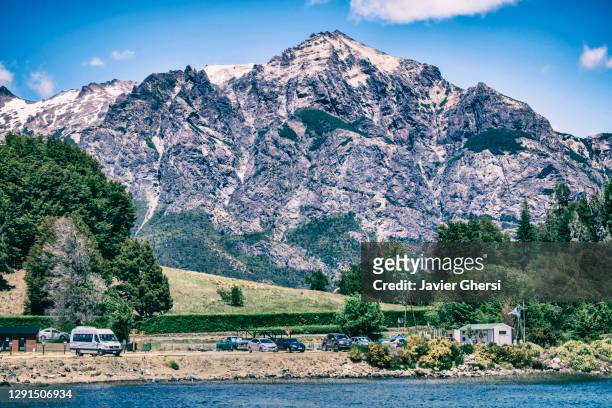 view of lake nahuel huapi and the mountains from puerto pañuelo. bariloche, río negro, patagonia, argentina. - pañuelo stock pictures, royalty-free photos & images