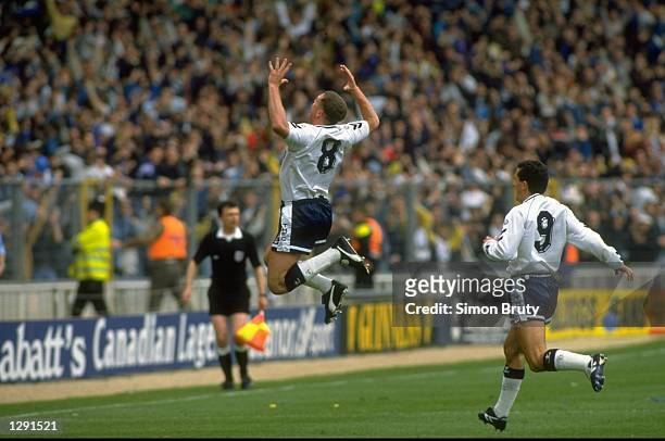 Paul Gascoigne of Tottenham Hotspur celebrates his 35 yard goal during the FA Cup Semi-Final against Arsenal at Wembley Stadium in London. Tottenham...