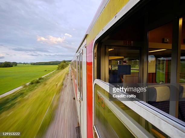 train passing through railway - germany train stock pictures, royalty-free photos & images