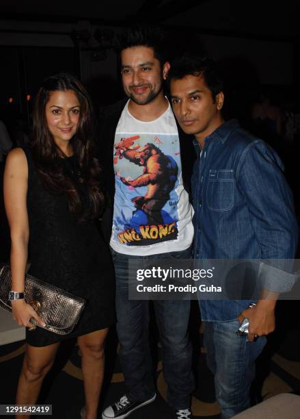 Amrita Arora, Aftab Shivdasani and Vikram Phadnis attend the Nandita Mahtani collection at the Chivas studio fashion show on January 16, 2011 in...