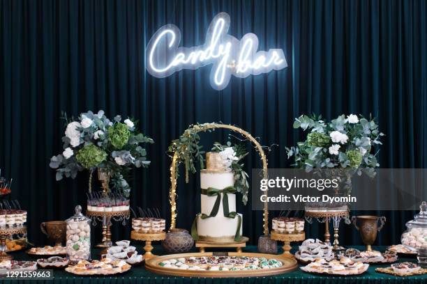 perfectly decorated candy bar at the celebration - wedding food stock pictures, royalty-free photos & images