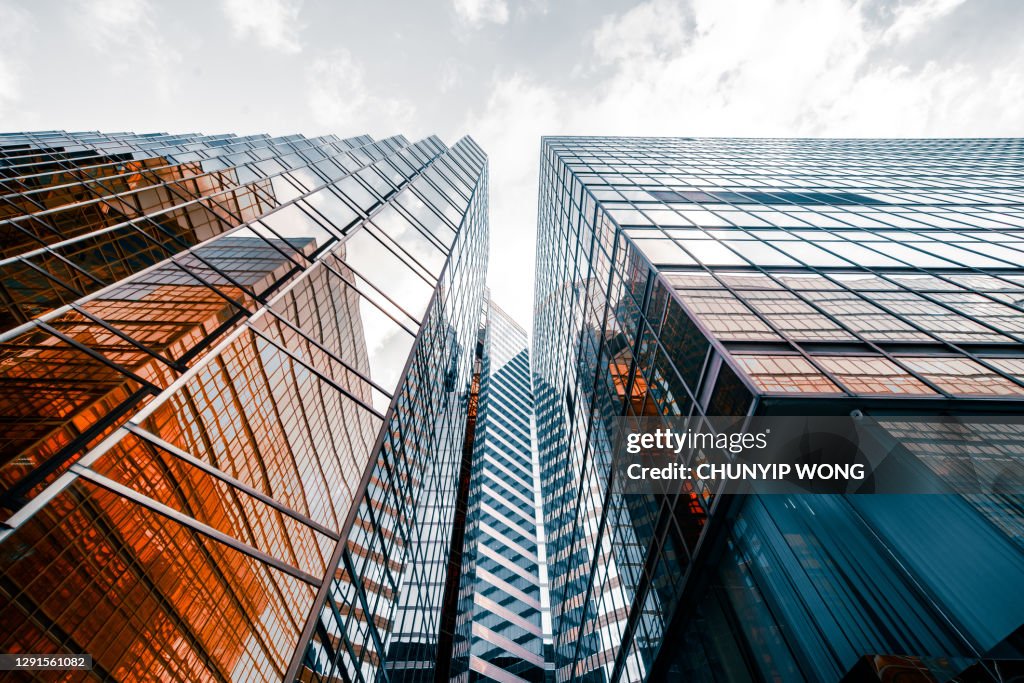 Looking directly up at the skyline of the financial district