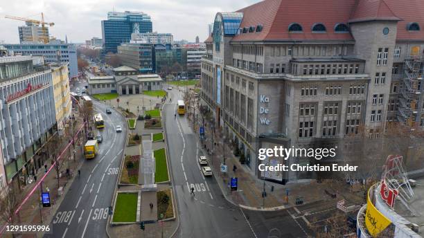 In this aerial view the KaDeWe department store and other stores stand shuttered on popular Tauentzienstrasse on the first day of a nationwide hard...