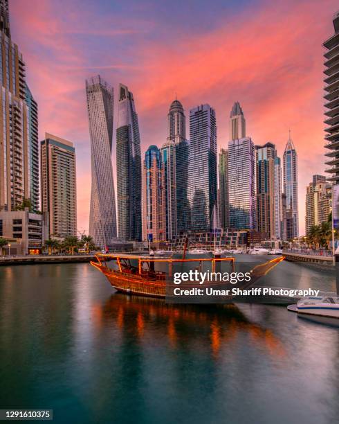 dubai marina skyscrapers skyline - dubai water canal stock pictures, royalty-free photos & images