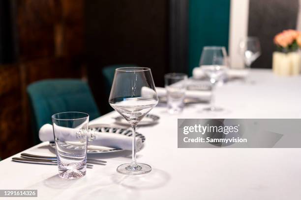 dining table in the luxury restaurant - elegant dinner party stock pictures, royalty-free photos & images