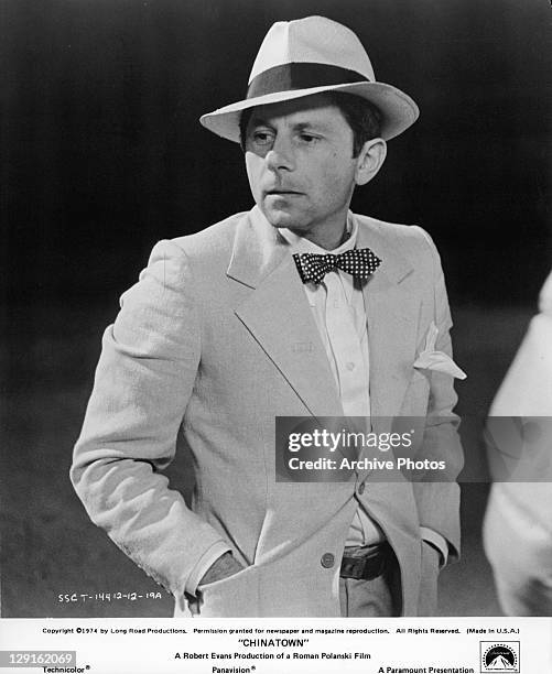 Roman Polanski with hands in pockets in a scene from the film 'Chinatown', 1974.