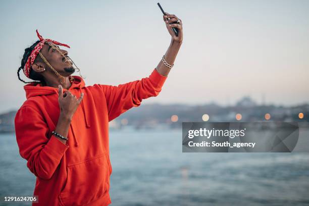 926 Gangster Smiley Stock Photos, High-Res Pictures, and Images - Getty ...