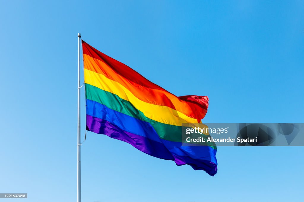 Rainbow LGBTQI flag waving in the wind