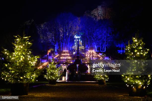 Flaming torches and fairy lights are seen as part of the annual Illuminated Lights Trail at Blenheim Palace on December 15, 2020 in Woodstock,...