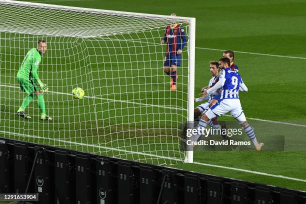 Willian Jose of Real Sociedad scores their team's first goal during the La Liga Santander match between FC Barcelona and Real Sociedad at Camp Nou on...