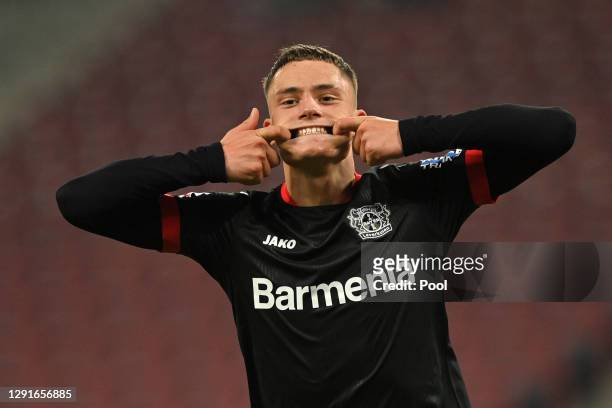 Florian Wirtz of Bayer Leverkusen celebrates after scoring their team's fourth goal during the Bundesliga match between 1. FC Koeln and Bayer 04...