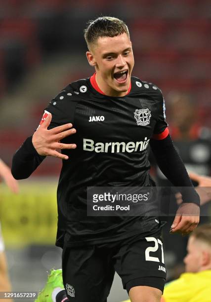 Florian Wirtz of Bayer Leverkusen celebrates after scoring their team's fourth goal during the Bundesliga match between 1. FC Koeln and Bayer 04...
