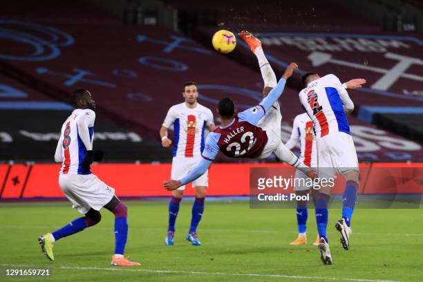 Sebastien Haller of West Ham United scores their team's first goal with an overhead kick during the Premier League match between West Ham United and...