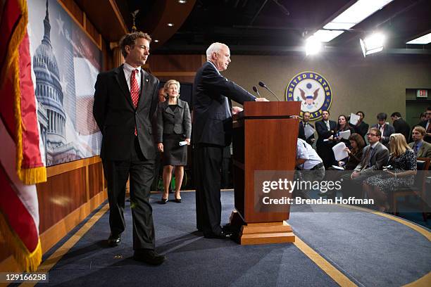 Sen. Rand Paul , U.S. Sen. Kay Bailey Hutchison , and U.S. Sen. John McCain arrive for a news conference on Capitol Hill to introduce a Republican...